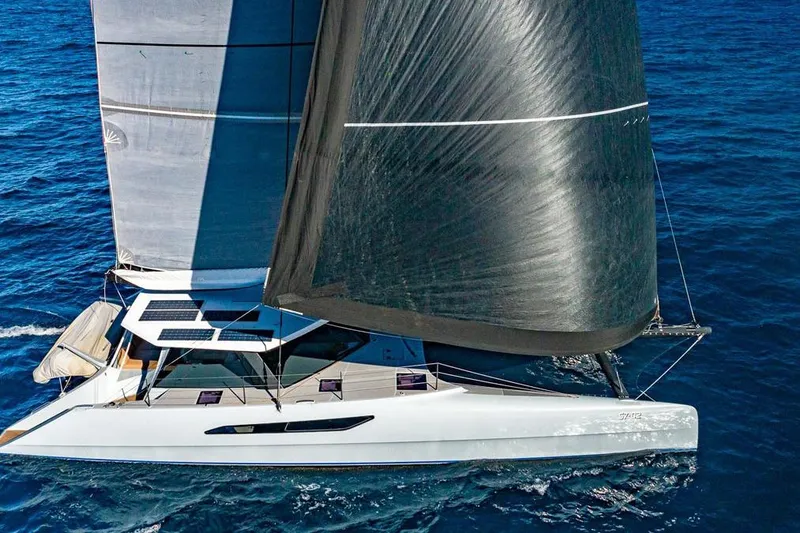 Slide: The Image of 2018 Gunboat 57 sailing yacht with sleek design on open ocean. - 69