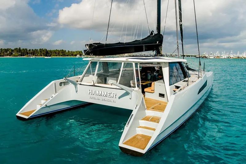 Slide: The Image of 2018 Gunboat 57 catamaran "Hammer" on turquoise water near Virginia Beach. - 9