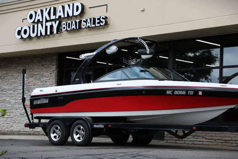 Slide: The Image of 2008 Malibu 21 vRide boat on trailer at Oakland County Boat Sales. - 0