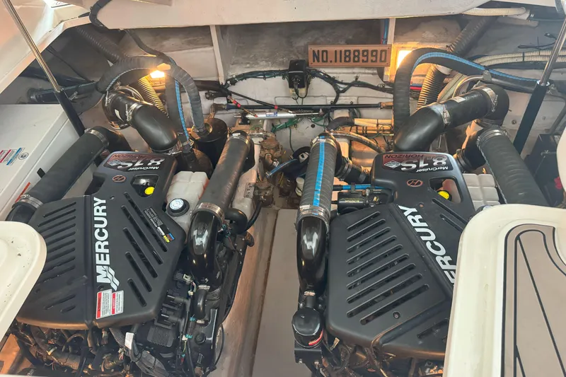 Slide: The Image of Engine room of 2006 Sea Ray 380 Sundancer with twin Mercury engines. - 25