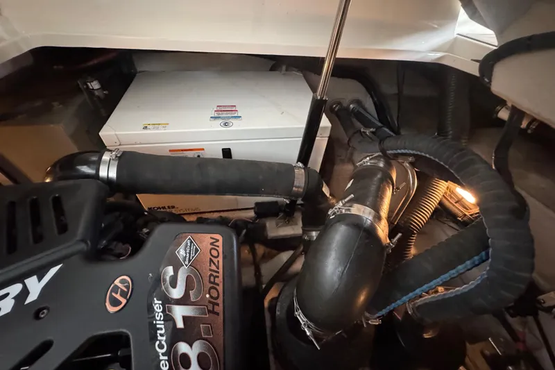 Slide: The Image of Engine room of 2006 Sea Ray 380 Sundancer with MerCruiser 8.1S Horizon engine components. - 26