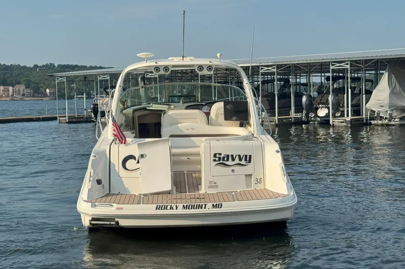 Slide: The Image of 2006 Sea Ray 380 Sundancer boat docked at marina, rear view. - 4