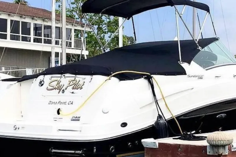 Slide: The Image of 2011 Sea Ray 240 Sundancer boat docked at Dana Point, CA marina. - 3