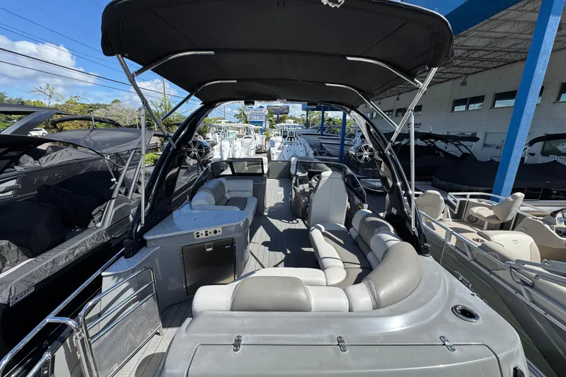 Slide: The Image of 2023 Avalon Excalibur 27' pontoon boat with spacious seating and sleek design. - 10