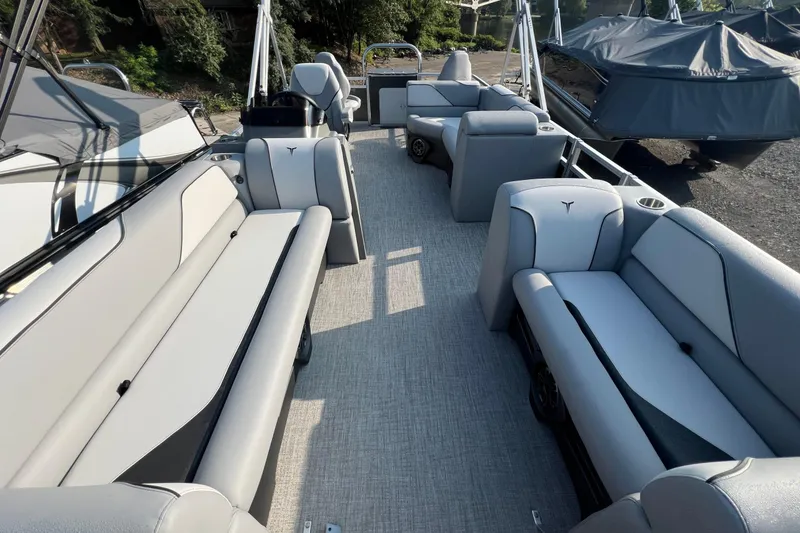 Slide: The Image of 2026 Tahoe Pontoon 2180 REAR FISH interior with spacious seating and modern design. - 17