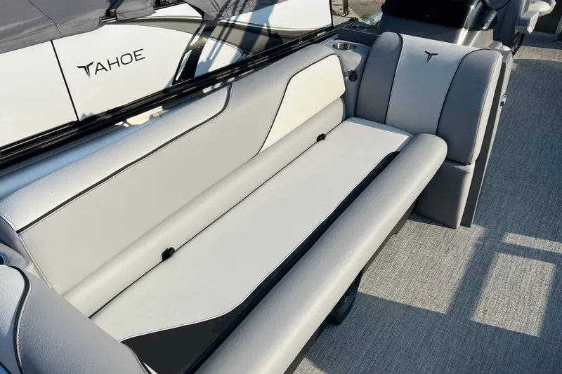 Slide: The Image of 2026 Tahoe Pontoon 2180 REAR FISH boat interior with sleek gray seating. - 19