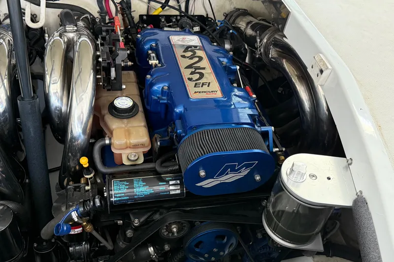 Slide: The Image of Engine of a 2004 Formula 400 Super Sport boat, featuring a Mercury 525 EFI. - 25
