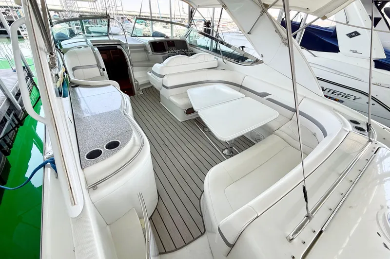 Slide: The Image of 2004 Formula 400 Super Sport yacht interior with sleek seating and modern amenities. - 6