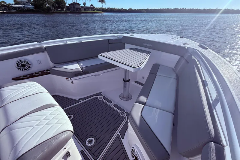 Slide: The Image of Luxurious seating area on 2023 Everglades 395 Center Console boat, featuring elegant design and waterfront view. - 28