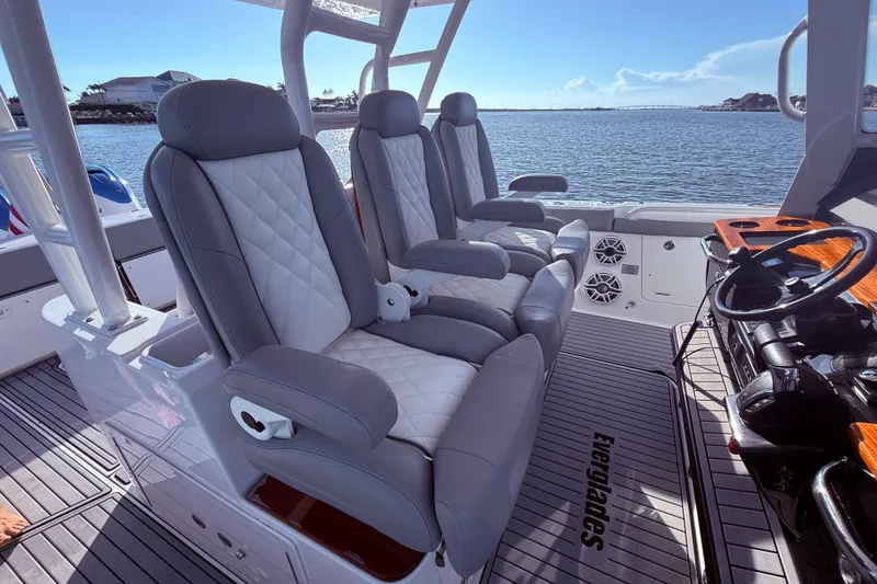 Slide: The Image of Luxurious seating on 2023 Everglades 395 Center Console boat, with ocean view. - 53