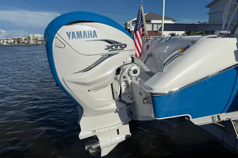 Slide: The Image of 2023 Everglades 395 Center Console with Yamaha XTO outboard engine on water. - 8