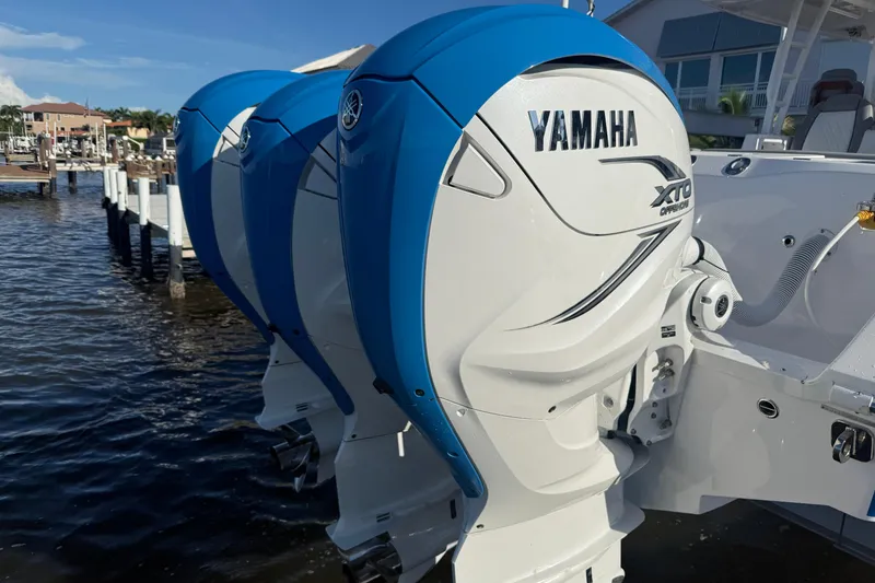 Slide: The Image of Triple Yamaha XTO outboard engines on 2023 Everglades 395 Center Console boat. - 9