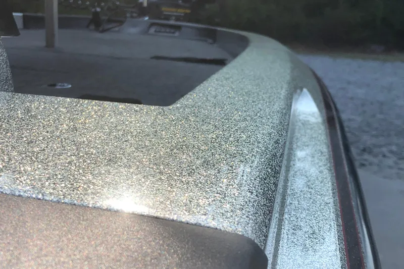 Slide: The Image of Close-up of 1993 Ranger Comanche 482v boat with glittery finish. - 15
