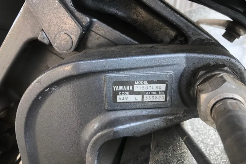 Slide: The Image of Close-up of Yamaha engine part with model and serial number label. - 17