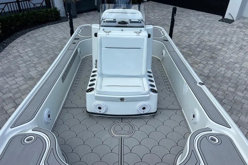 Slide: The Image of 2016 Yellowfin 24 Bay boat with sleek deck design and comfortable seating. - 23