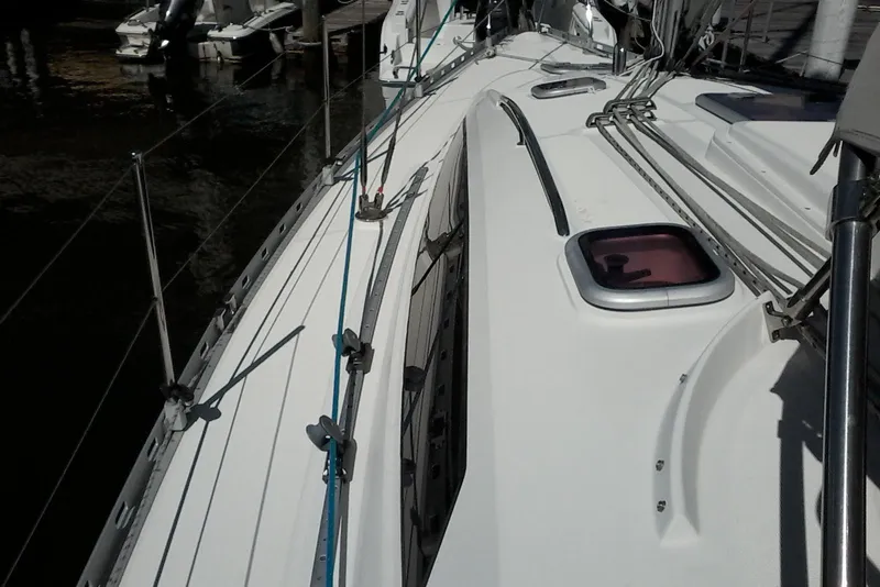 Slide: The Image of 2007 Delphia 33 sailboat deck with rigging and hatch details. - 17