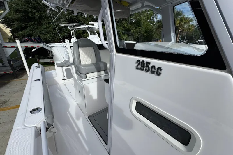 Slide: The Image of 2022 Everglades 295 Center Console boat interior with seating and console details. - 26