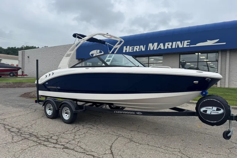 The Image of 2026 Chaparral 21 SSi boat on trailer at Hern Marine dealership. - 0