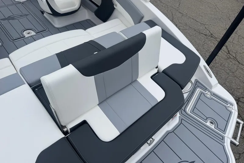 Slide: The Image of 2026 Chaparral 21 SSi boat storage compartment with branded interior design. - 23