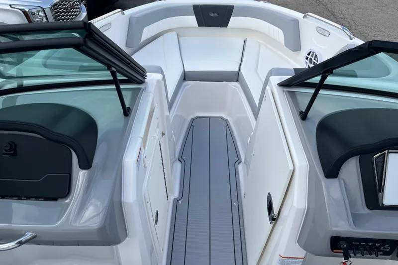 Slide: The Image of 2026 Chaparral 21 SSi boat interior with open windshield and seating area. - 8