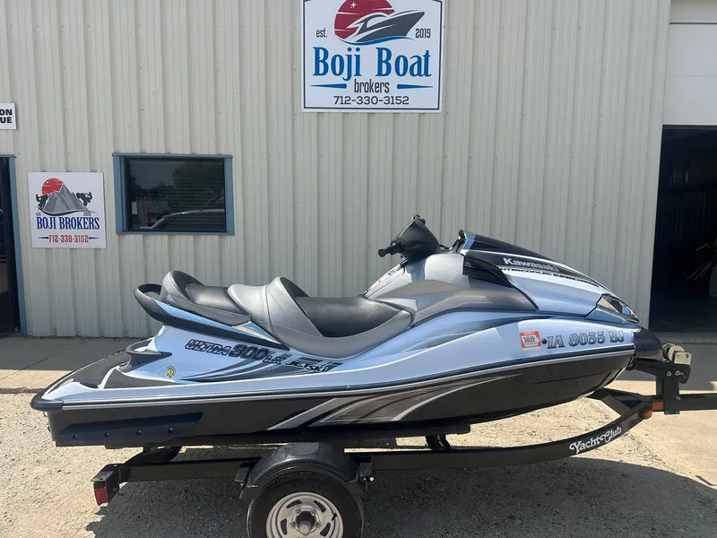 Slide: The Image of 2012 Kawasaki 300 LX Ultra jet ski on trailer outside Boji Boat Brokers. - 0