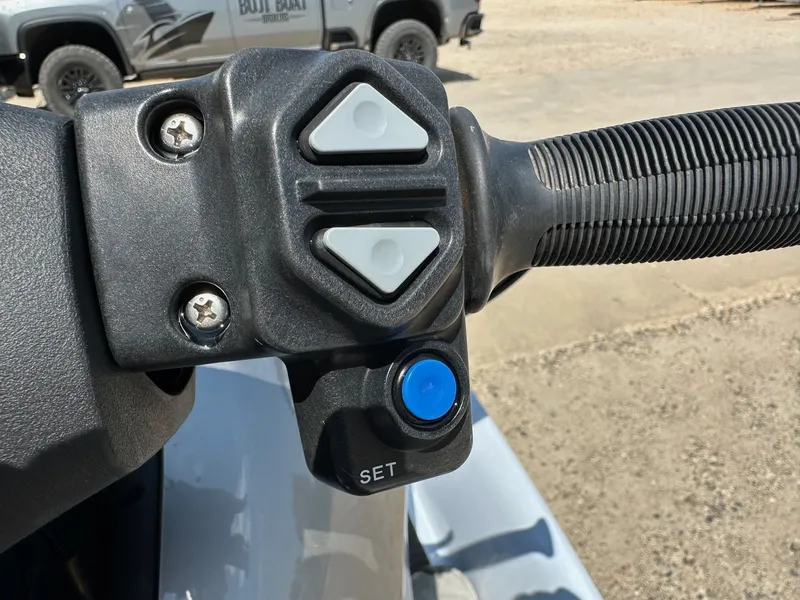 Slide: The Image of Close-up of Kawasaki 300 LX Ultra 2012 handlebar controls with buttons and grip. - 10