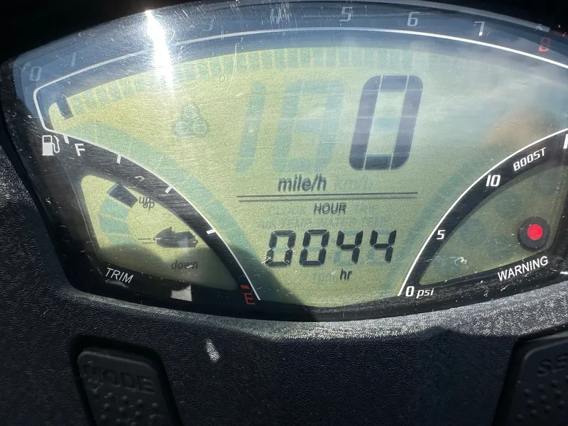 Slide: The Image of Kawasaki 300 LX Ultra 2012 dashboard showing 844 hours and speedometer. - 12
