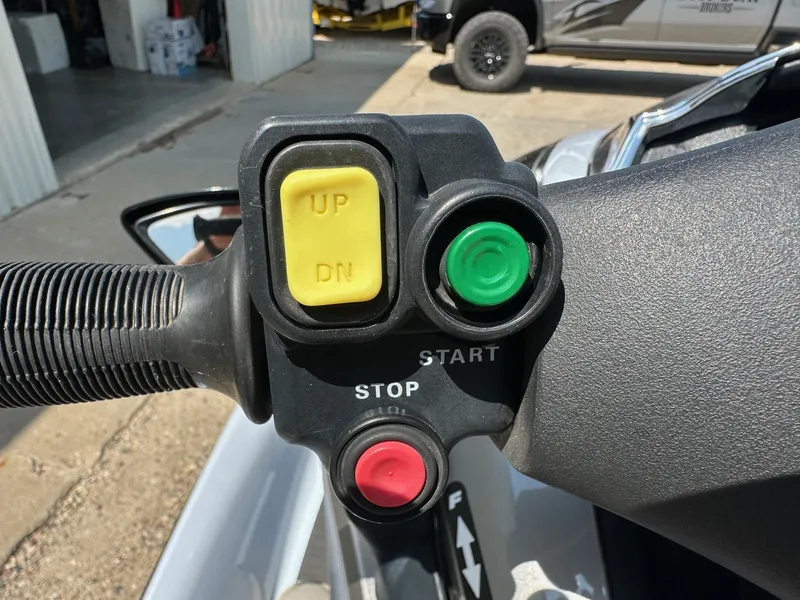 Slide: The Image of Handlebar controls of a 2012 Kawasaki 300 LX Ultra jet ski. - 9