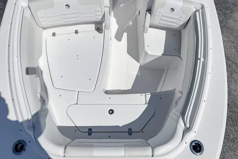 Slide: The Image of 2025 Edgewater 262CX Crossover boat interior, featuring spacious seating and sleek design. - 32