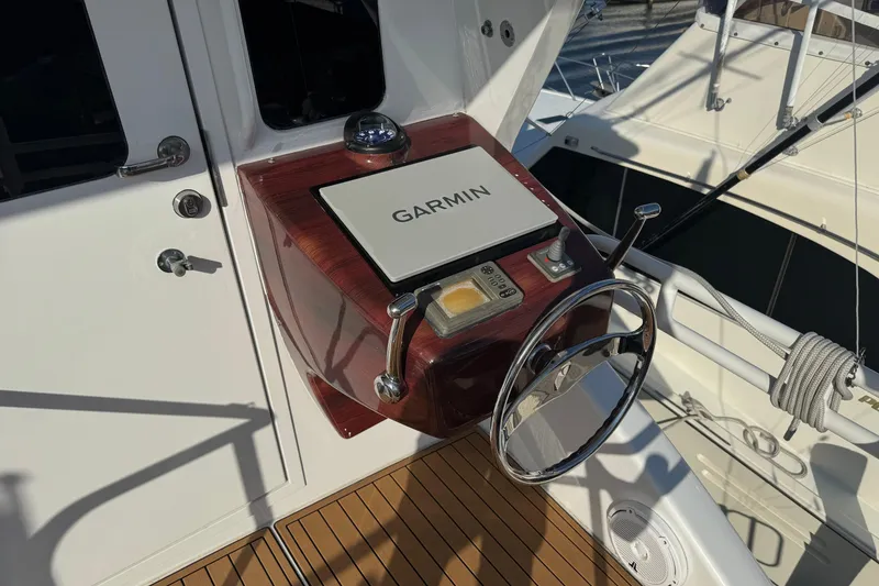 Slide: The Image of Steering console of 2002 Viking 61 Enclosed Bridge with Garmin navigation system. - 20