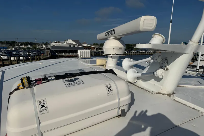 Slide: The Image of Rooftop of 2002 Viking 61 Enclosed Bridge with Garmin radar and equipment. - 25