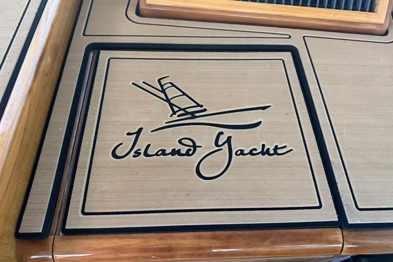 Slide: The Image of "Island Yacht" logo on 2002 Viking 61 Enclosed Bridge boat interior. - 51