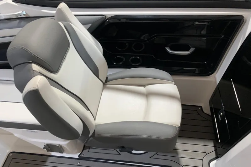 Slide: The Image of 2017 Yamaha Boats 212 Limited interior with gray and white seating. - 12