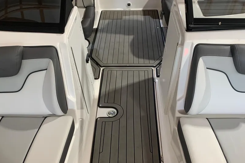 Slide: The Image of 2017 Yamaha Boats 212 Limited interior with sleek seating and modern flooring design. - 16