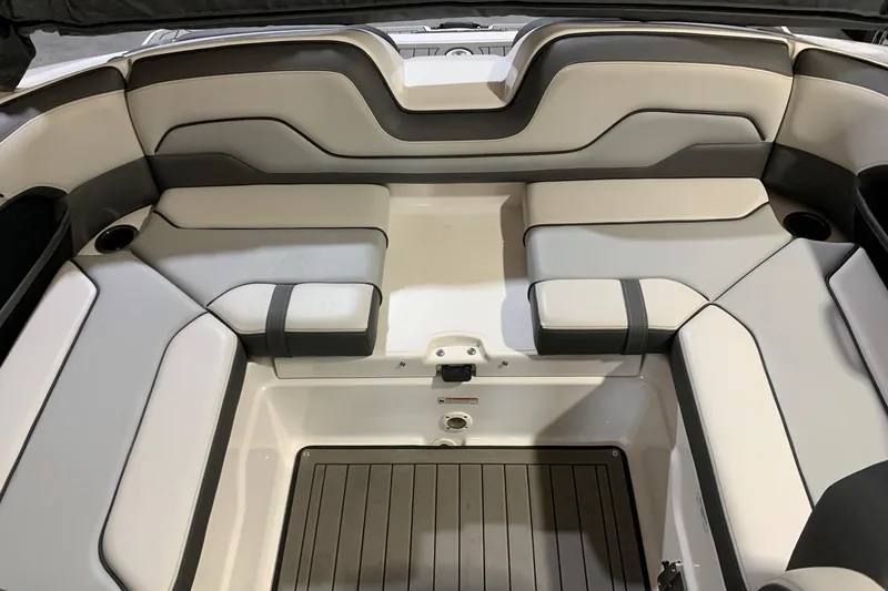 Slide: The Image of 2017 Yamaha Boats 212 Limited interior seating, featuring sleek, modern design and comfortable upholstery. - 17