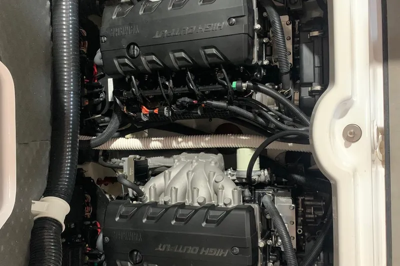 Slide: The Image of Engine compartment of a 2017 Yamaha Boats 212 Limited, showcasing dual high-output engines. - 20