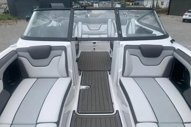 Slide: The Image of 2017 Yamaha Boats 212 Limited interior with sleek seating and modern design. - 6