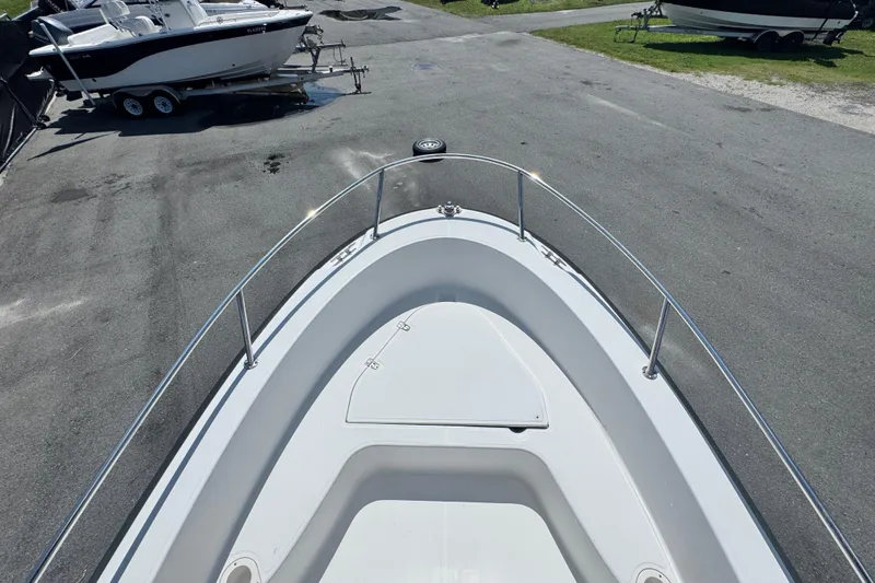 Slide: The Image of 2005 Boston Whaler 190 Nantucket boat, view from bow, parked on asphalt. - 20
