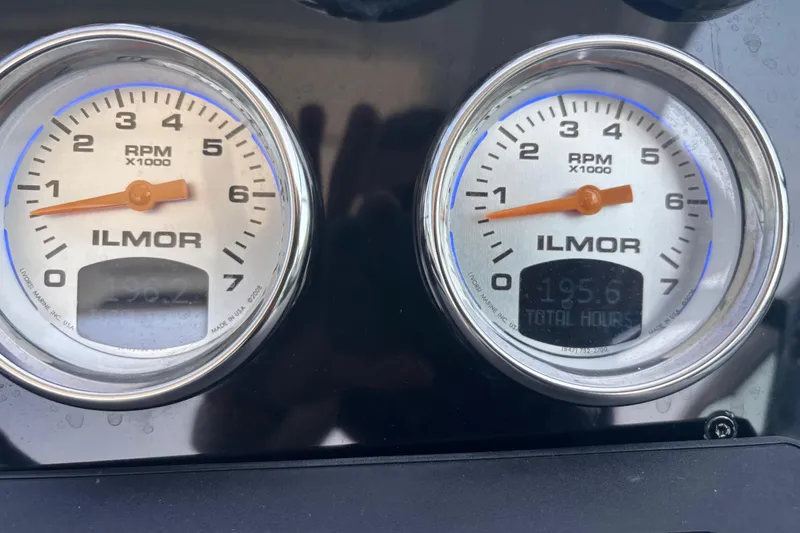 Slide: The Image of Close-up of Ilmor RPM gauges on a 2021 Formula 350ss boat dashboard. - 26