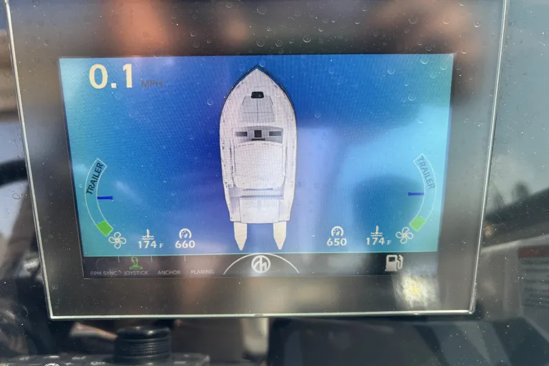 Slide: The Image of Dashboard display of a 2021 Formula 350ss boat showing speed and engine data. - 28