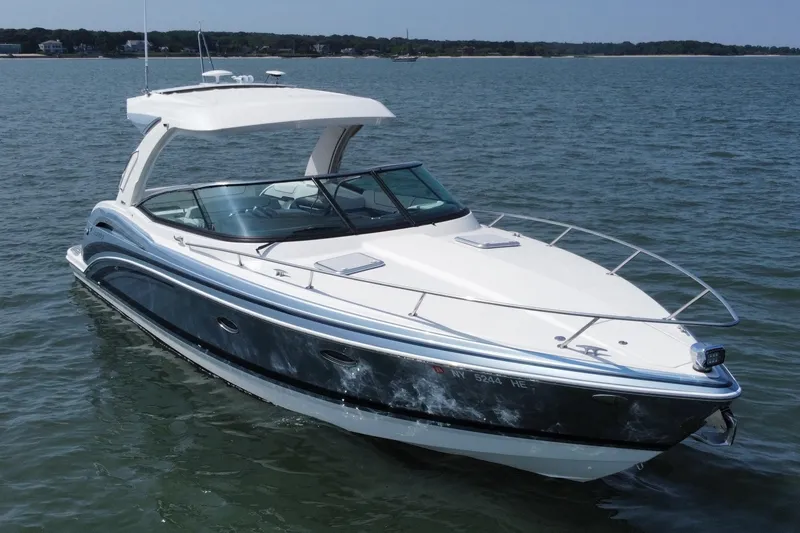 Slide: The Image of 2021 Formula 350ss luxury boat cruising on open water. - 3