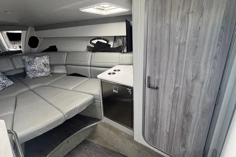 Slide: The Image of 2021 Formula 350ss cabin interior with modern seating and wood accents. - 30