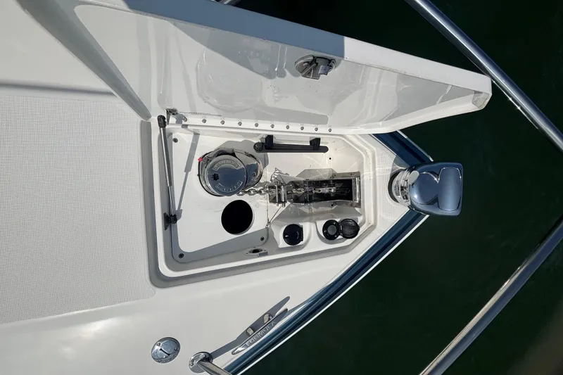 Slide: The Image of 2021 Formula 350ss boat anchor compartment with winch and chain, viewed from above. - 36