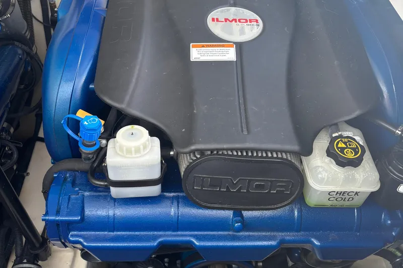 Slide: The Image of 2021 Formula 350ss engine featuring Ilmor components, showcasing detailed engine parts and branding. - 40