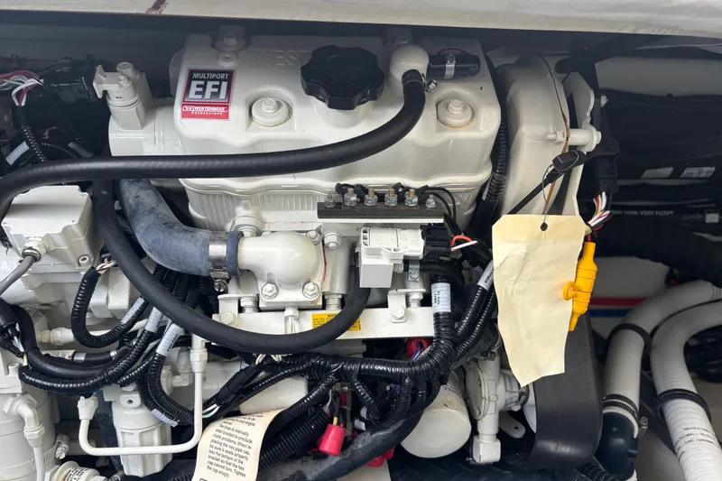 Slide: The Image of Engine compartment of a 2021 Formula 350ss with multiport EFI system. - 43