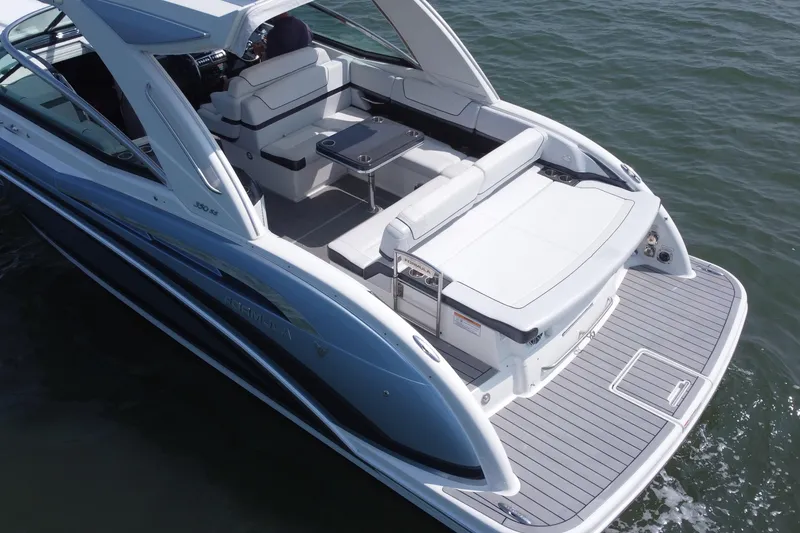 Slide: The Image of 2021 Formula 350ss luxury boat with spacious seating and sleek design on the water. - 53