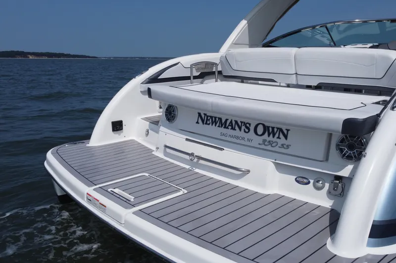Slide: The Image of 2021 Formula 350ss boat on water, featuring spacious deck and sleek design. - 59