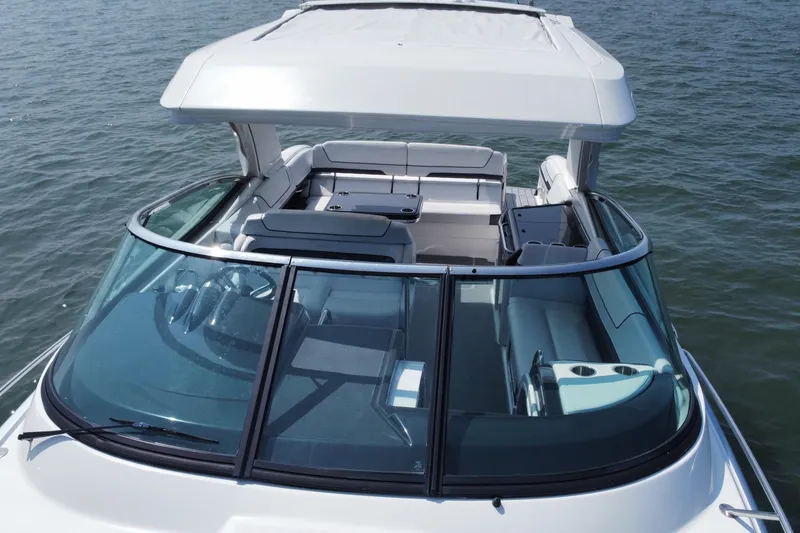 Slide: The Image of 2021 Formula 350ss boat with spacious seating and sleek design on open water. - 7