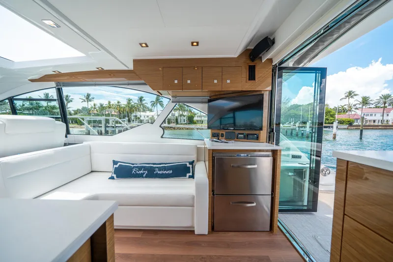 Slide: The Image of Luxurious interior of 2019 Cruisers Yachts Cantius with modern design and waterfront view. - 21