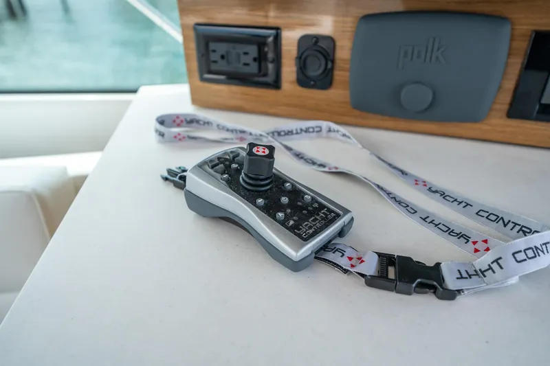 Slide: The Image of Remote control on a 2019 Cruisers Yachts Cantius, featuring yacht control lanyard. - 29